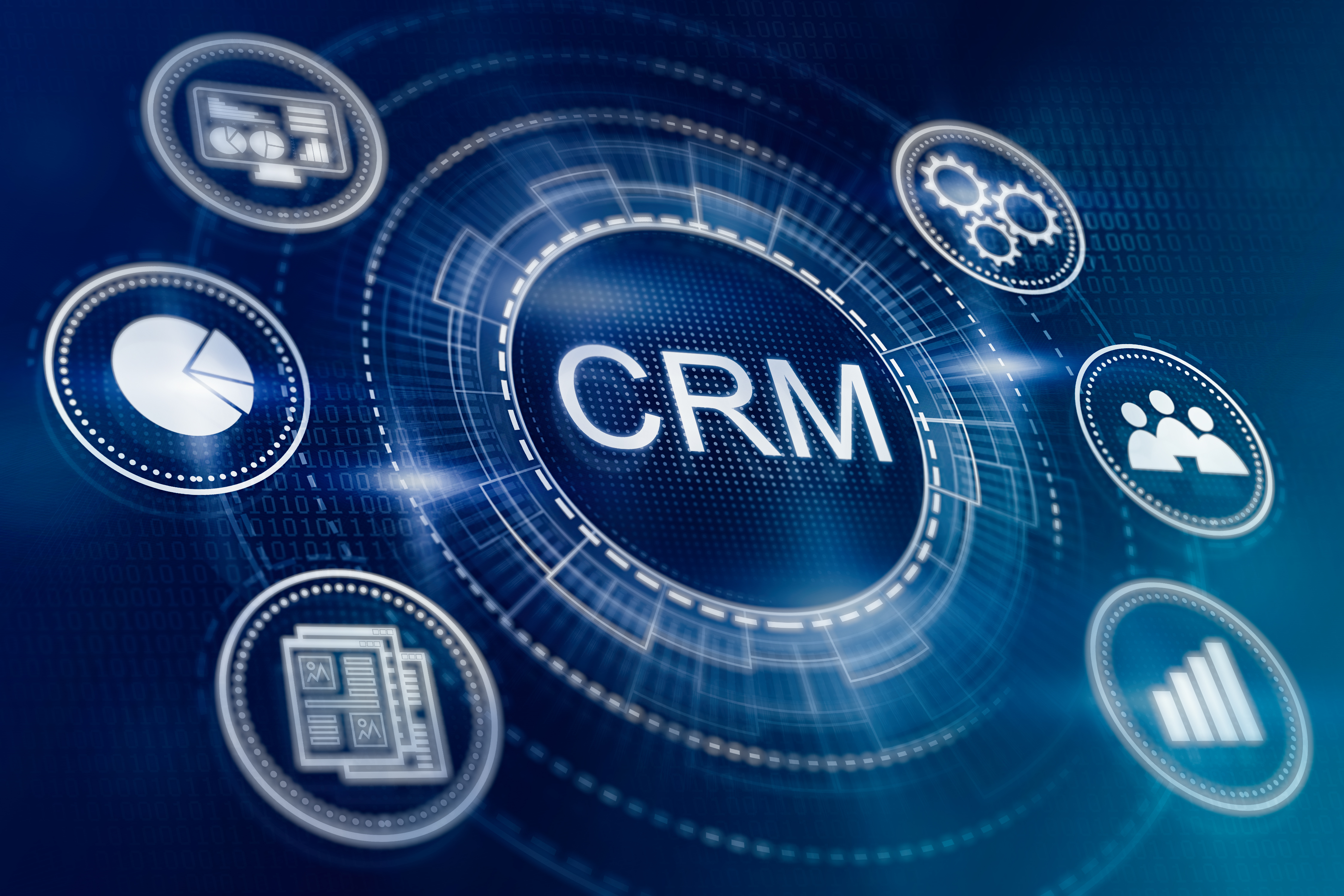 CRM Darstellung als Grafik umgeben von mehreren IT Symoblen