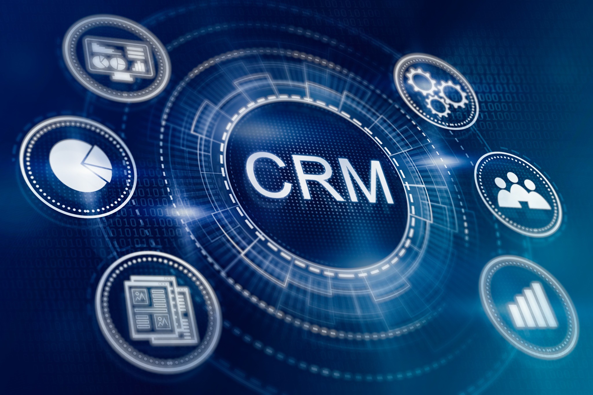 CRM Darstellung als Grafik umgeben von mehreren IT Symoblen